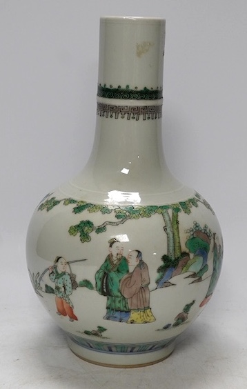 A Chinese famille verte bottle vases, Kangxi mark but later, 25.5cm. Condition - good.